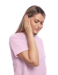 Young woman suffering from ear pain on white background