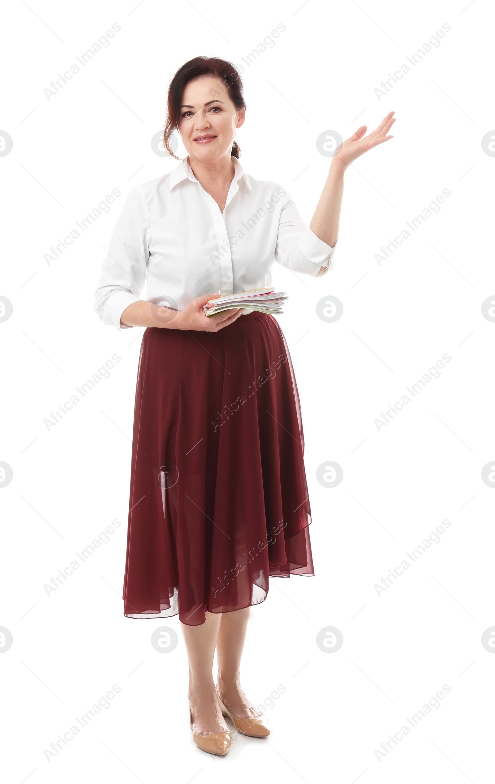 Photo of Female teacher with notebooks on white background