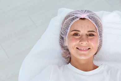 Woman after face biorevitalization procedure in salon. Cosmetic treatment