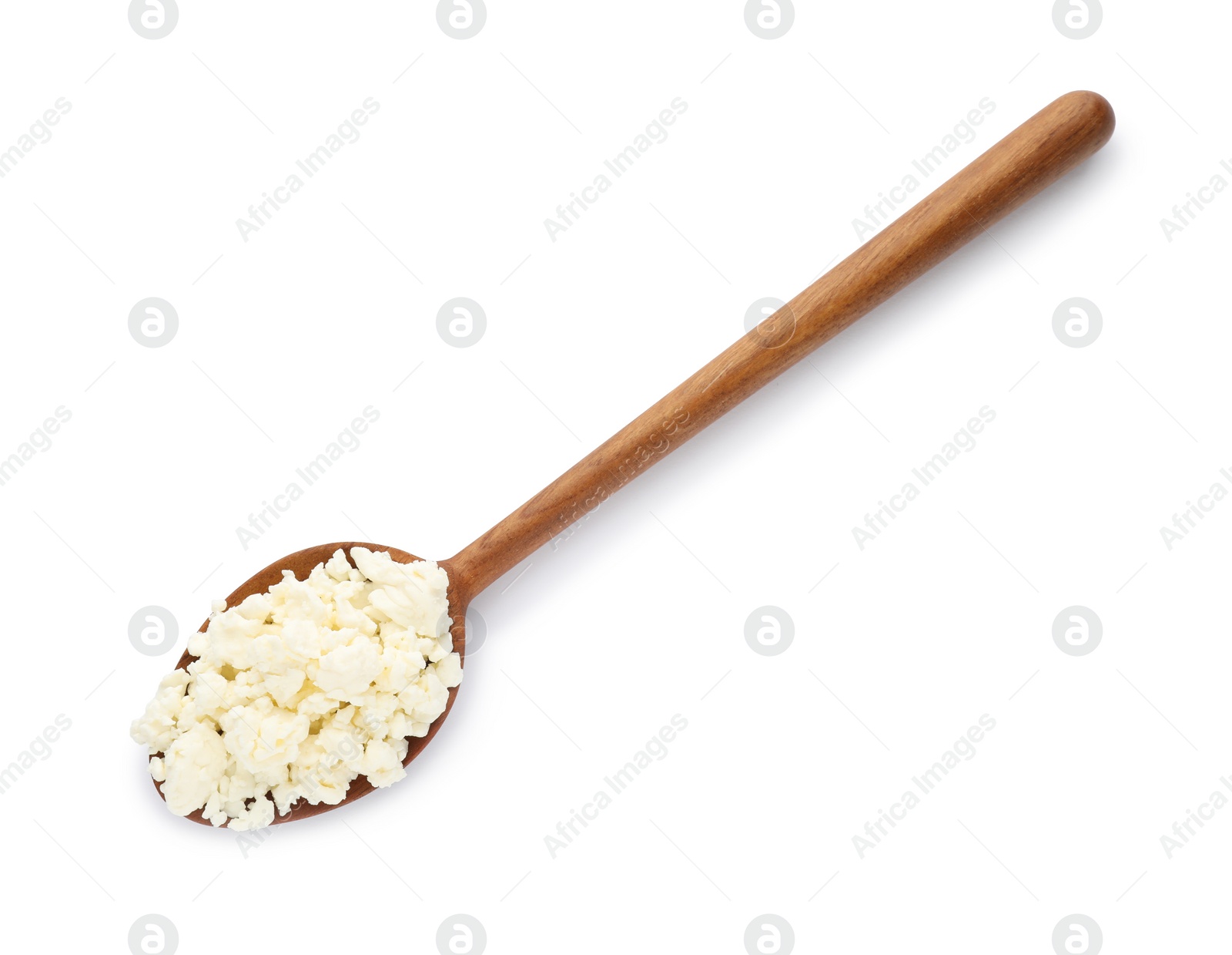 Photo of Delicious fresh cottage cheese in spoon isolated on white, top view