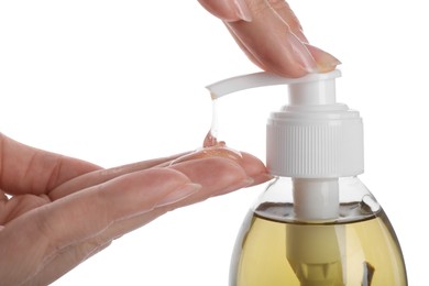 Photo of Woman using liquid soap dispenser on white background, closeup