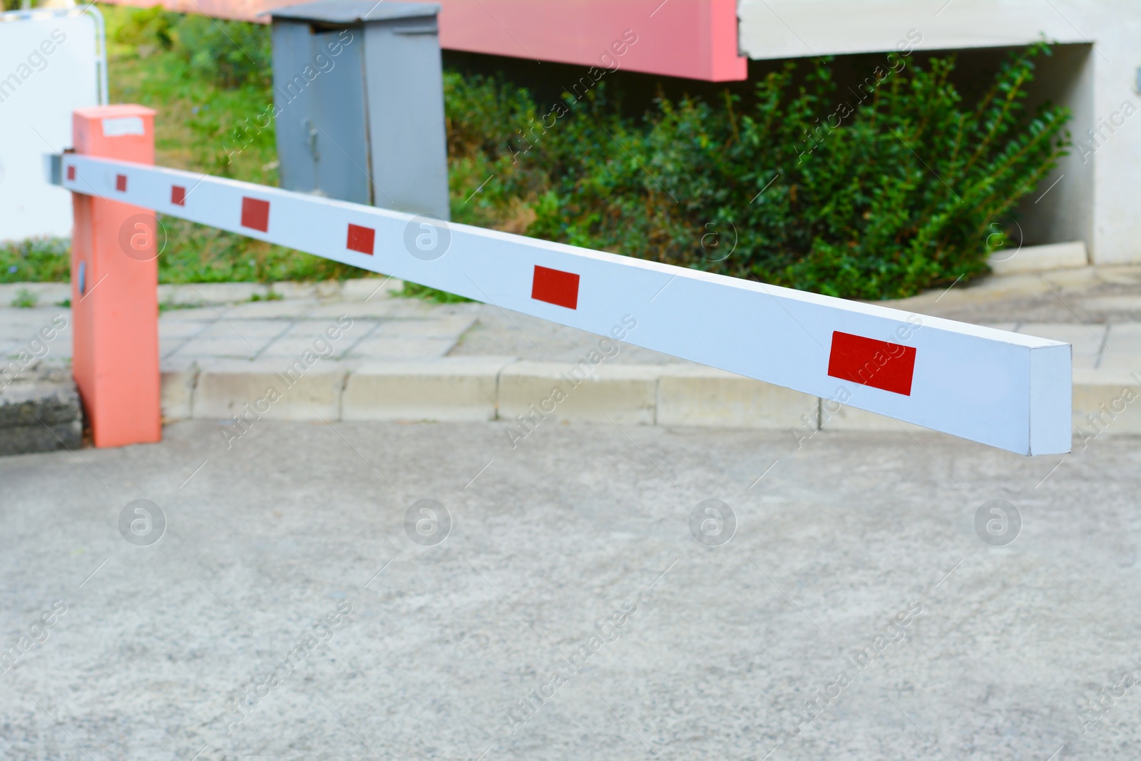 Photo of Closed boom barrier on autumn day outdoors