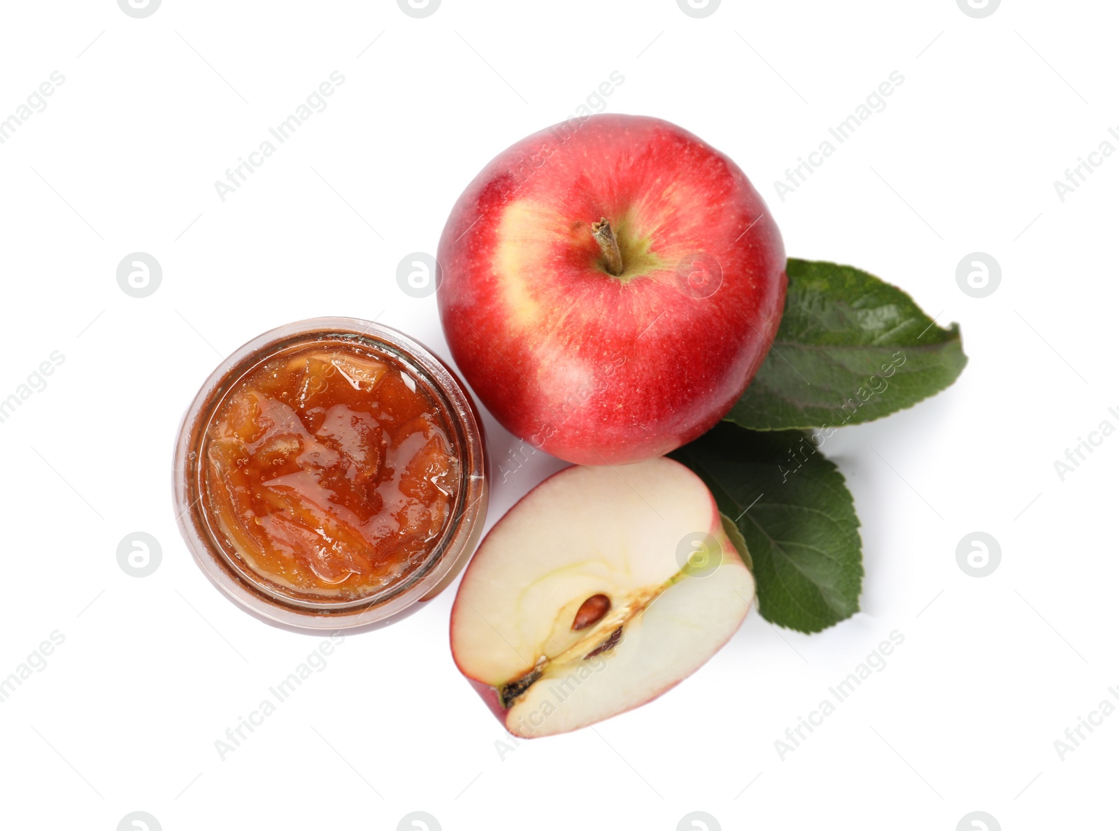 Photo of Tasty apple jam in glass jar and fresh fruits on white background, top view