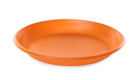 Disposable orange plastic plate isolated on white