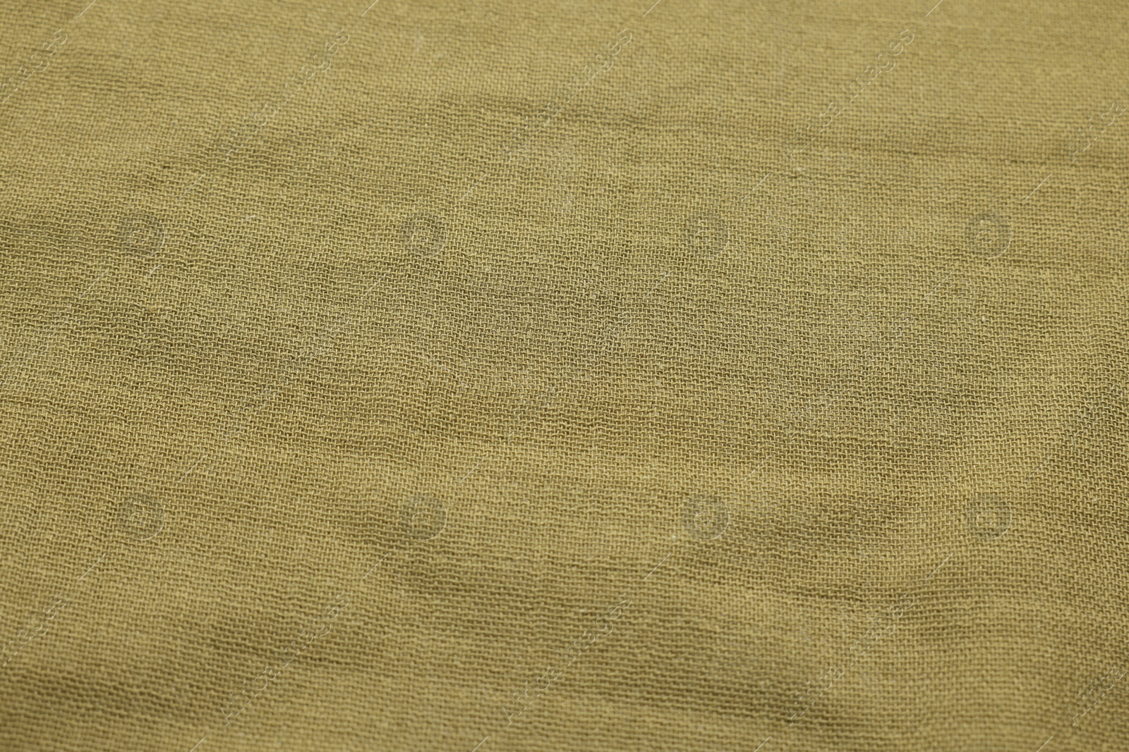 Photo of Texture of olive fabric as background, above view