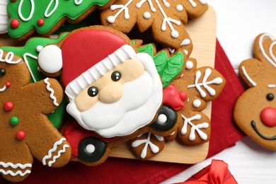 Tasty homemade Christmas cookies on white wooden table, top view