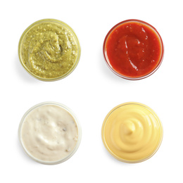 Image of Set of different delicious sauces on white background, top view