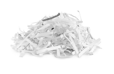 Photo of Many shredded paper strips on white background