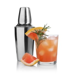 Photo of Metal shaker and delicious cocktail with grapefruit isolated on white