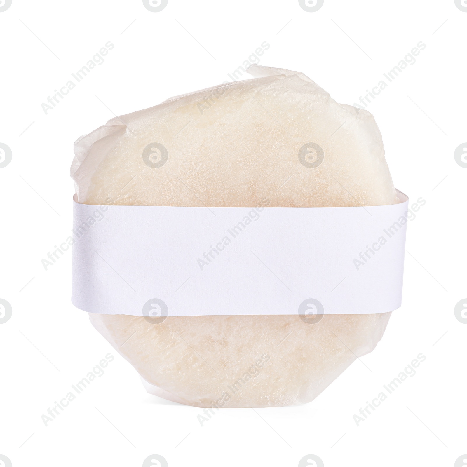 Photo of Solid shampoo bar wrapped in parchment isolated on white