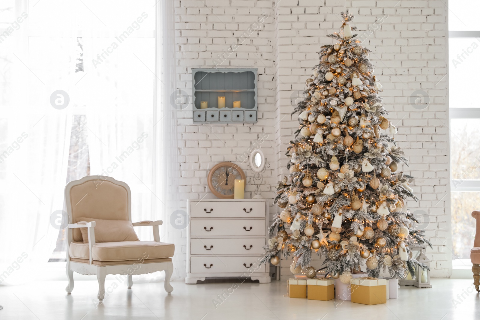 Photo of Beautiful room interior with decorated Christmas tree