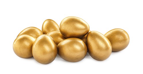 Photo of Many shiny golden eggs on white background