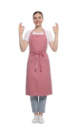 Photo of Beautiful young woman in clean striped apron on white background