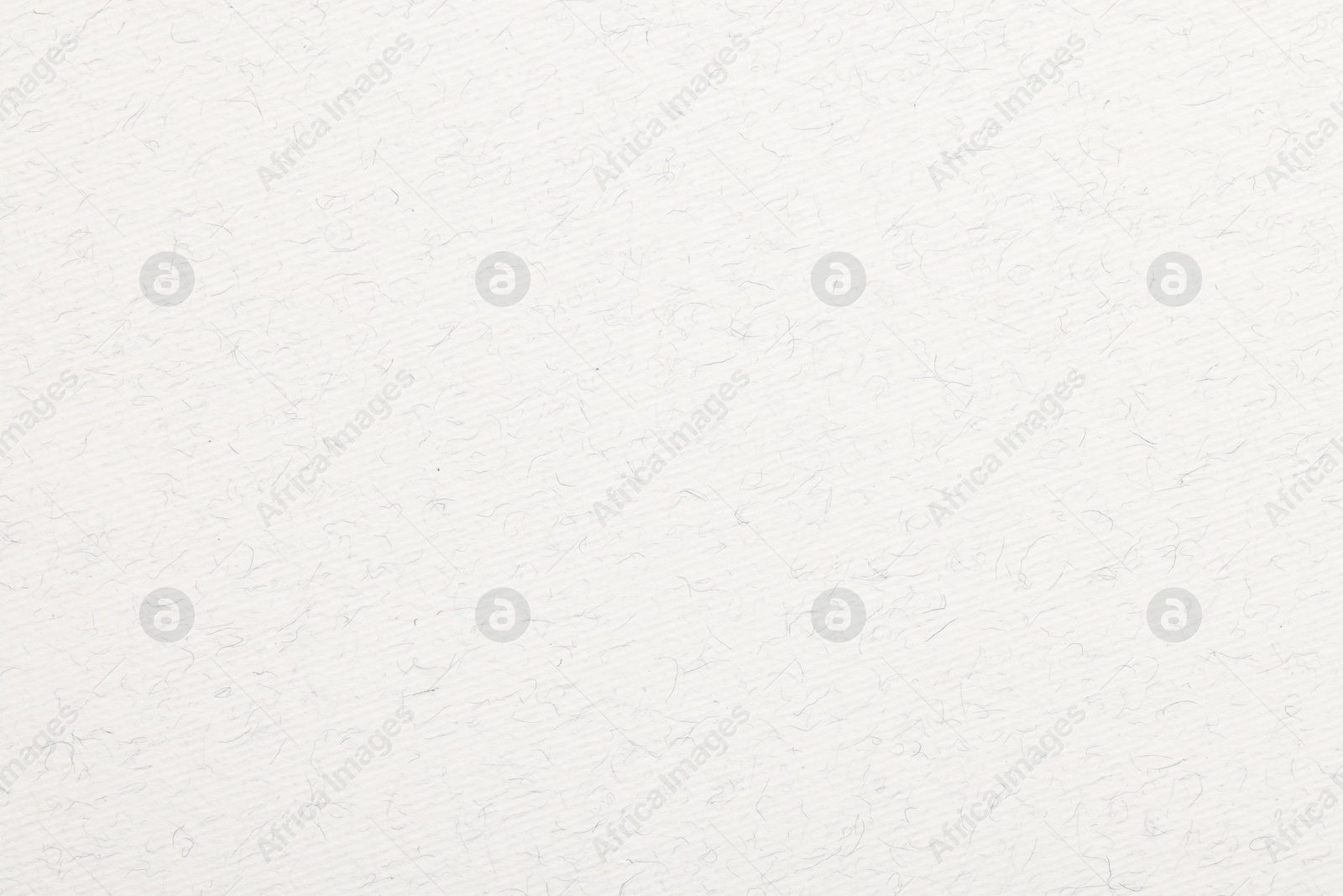Photo of Texture of white paper sheet as background, top view