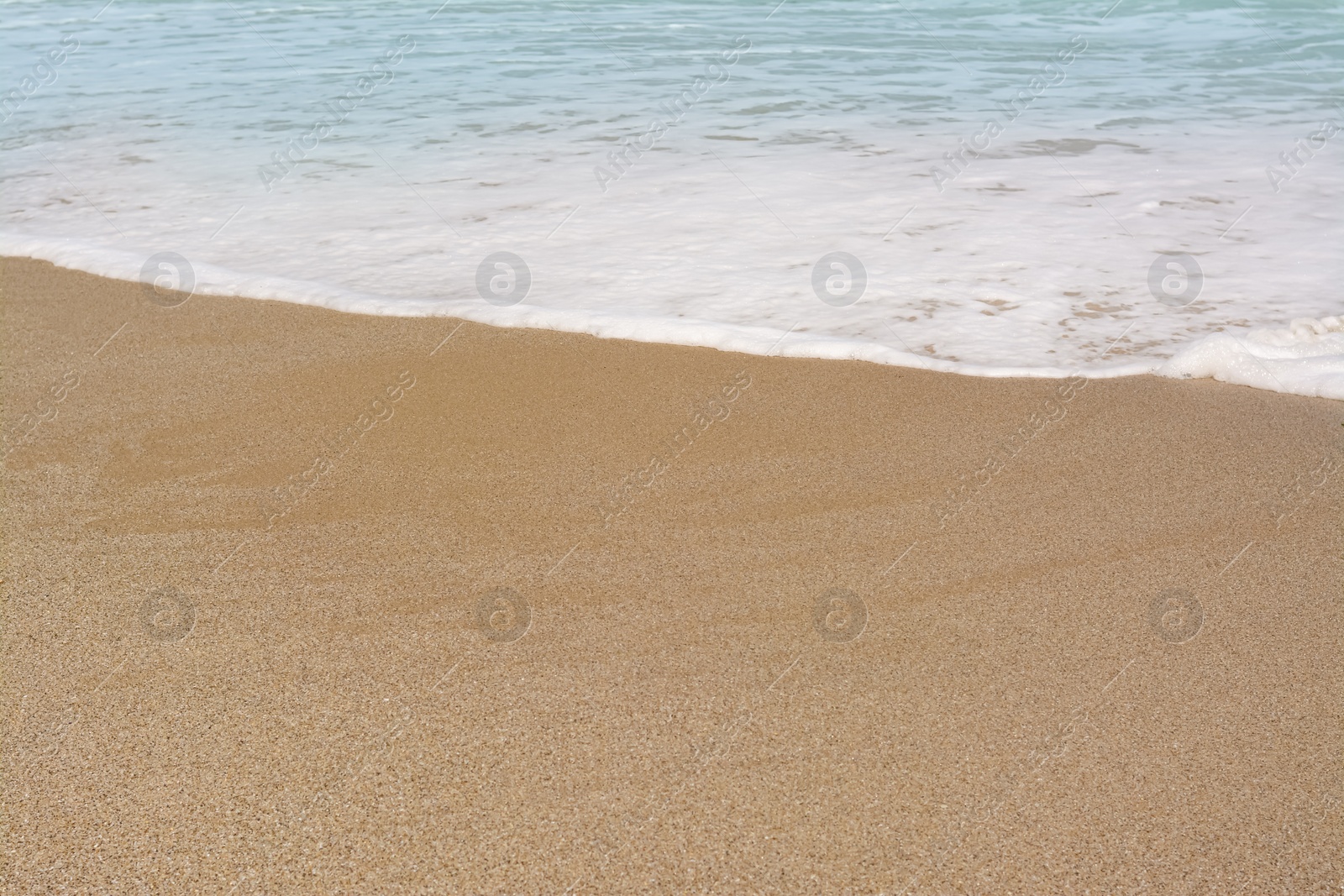 Photo of Beautiful view of sandy beach and sea. Summer vacation