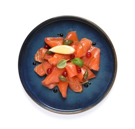 Photo of Salmon carpaccio with capers, cranberries, basil and lemon isolated on white, top view