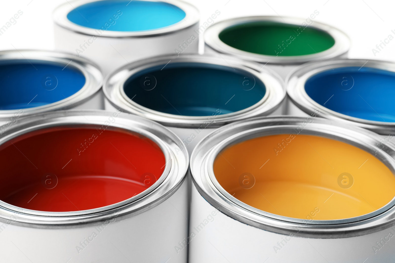 Photo of Open paint cans, closeup view. Professional material