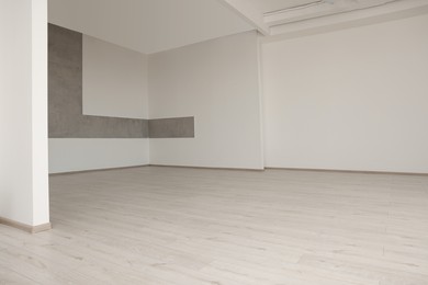 Empty renovated room with clean light walls