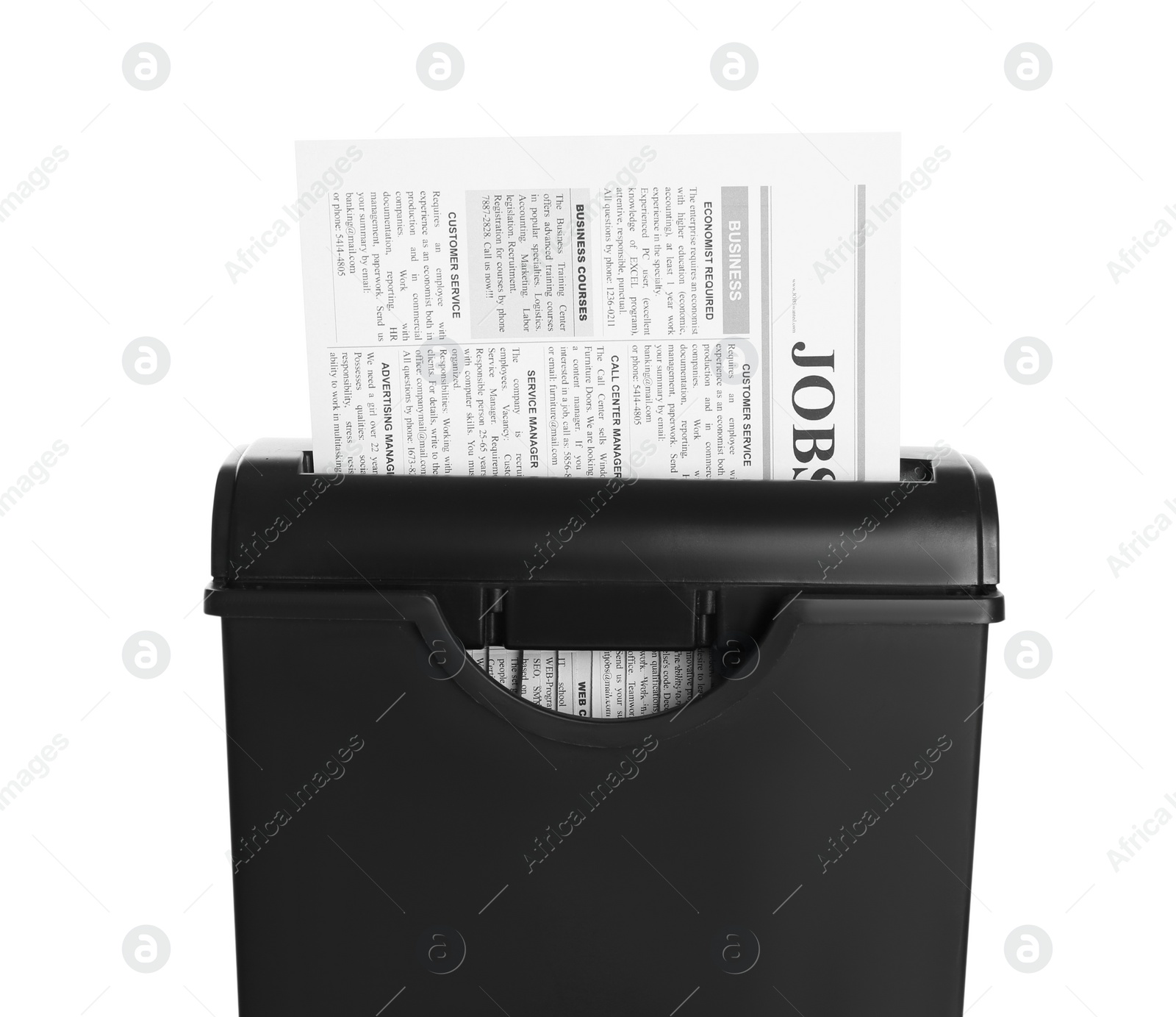 Photo of Paper shredder with newspaper isolated on white