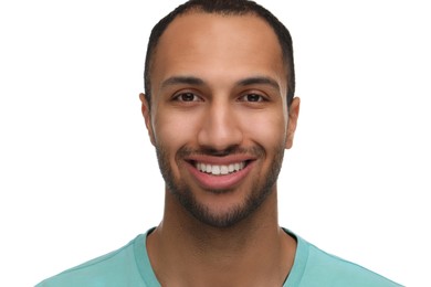 Portrait of smiling man with healthy clean teeth on white background