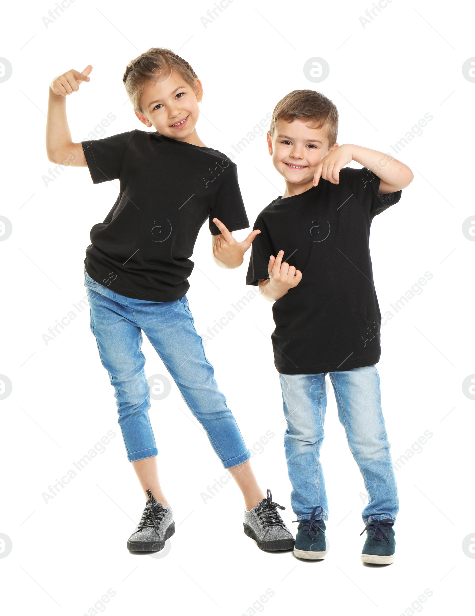 Photo of Little kids in t-shirts on white background. Mockup for design