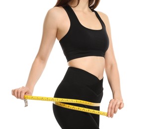 Photo of Woman with measuring tape showing her slim body on white background, closeup
