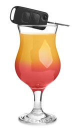 Photo of Glass of alcohol cocktail and car key on white background. Drunk driving concept