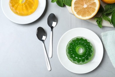 Photo of Flat lay composition with fruit jelly on light grey table