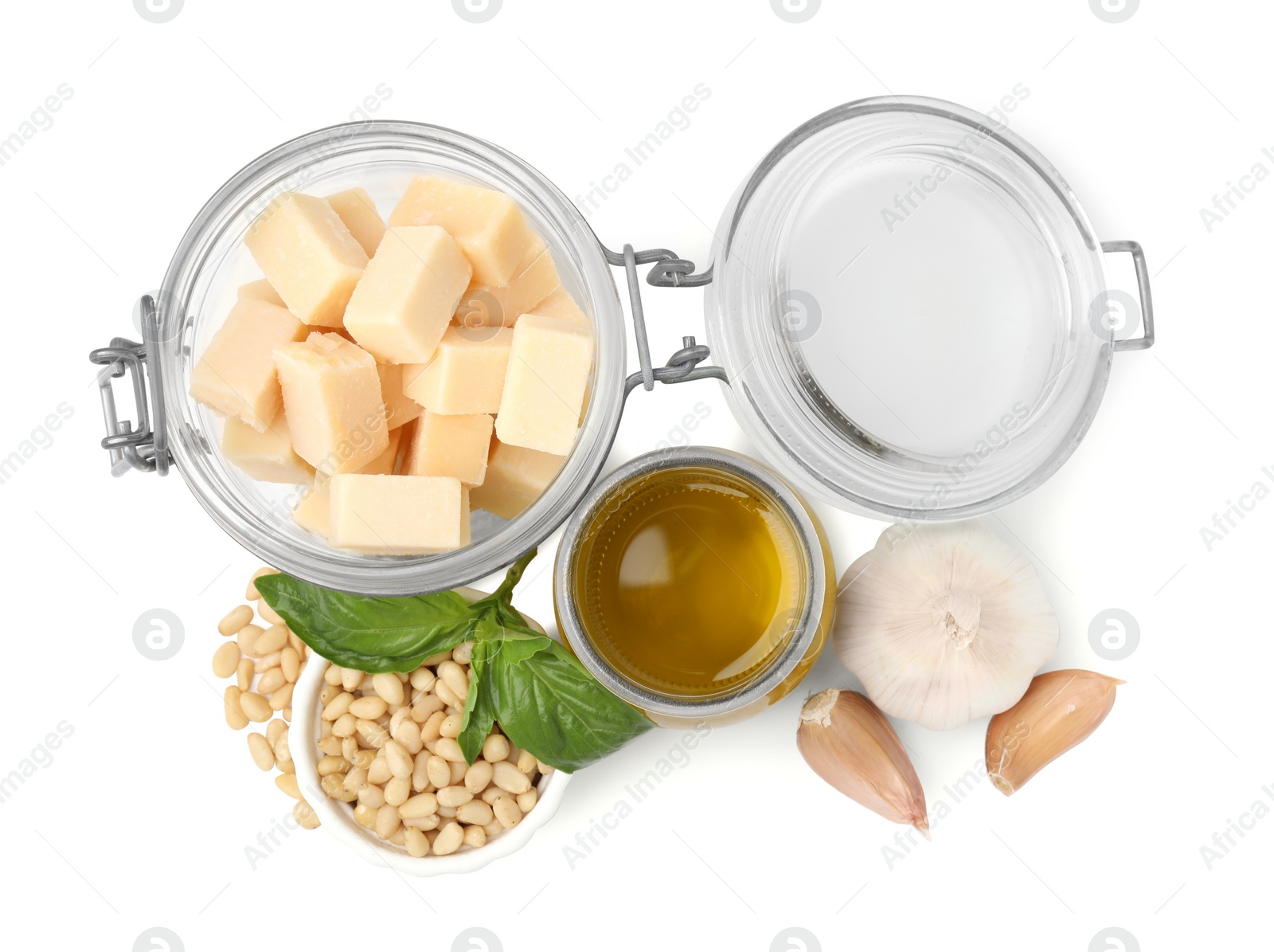 Photo of Different ingredients for cooking tasty pesto sauce isolated on white, top view