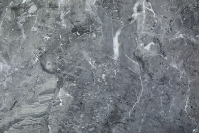 Texture of grey marble stone surface as background, closeup