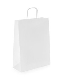 Photo of One paper shopping bag isolated on white