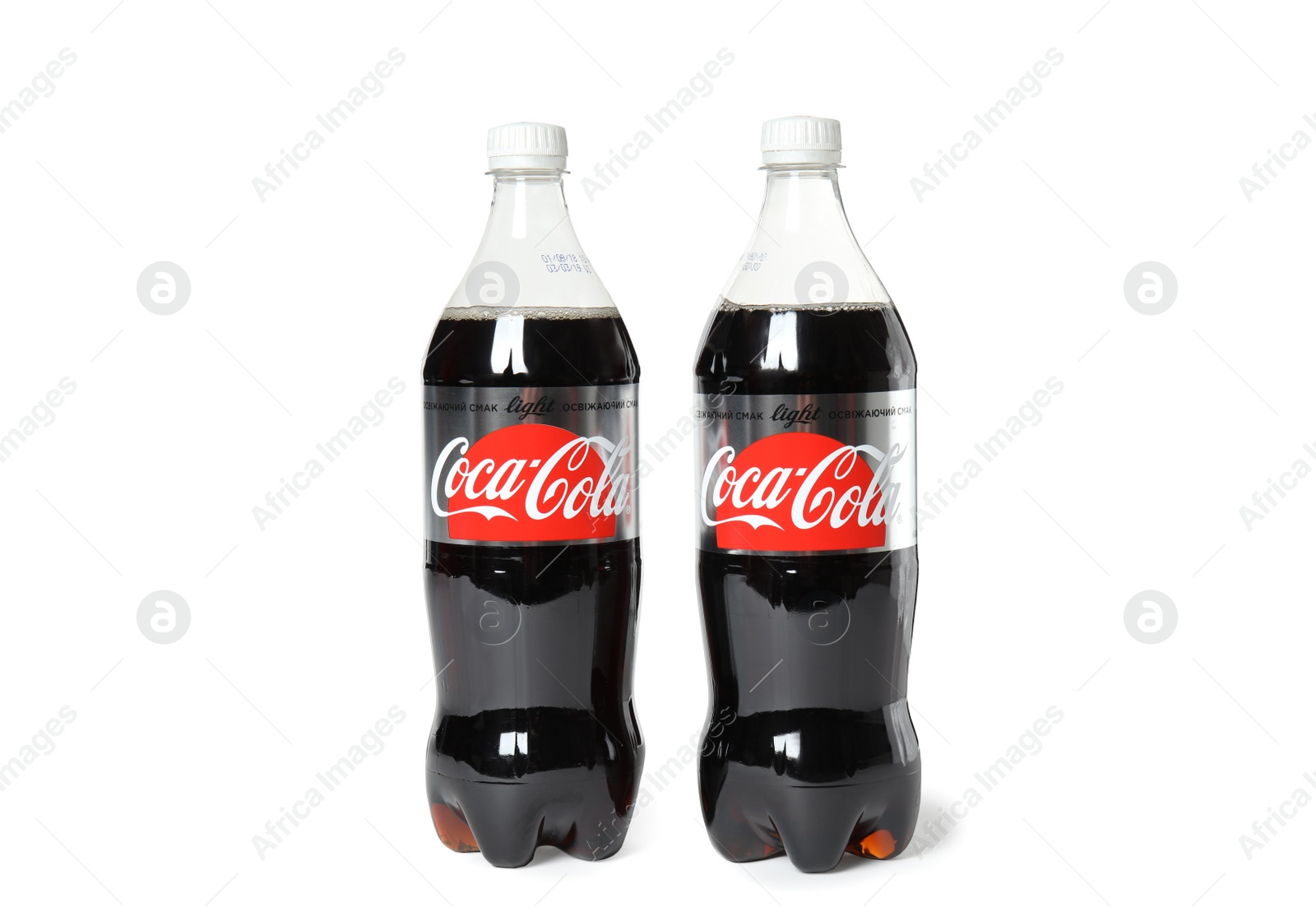 Photo of MYKOLAIV, UKRAINE - NOVEMBER 14, 2018: Bottles of Coca-Cola on white background