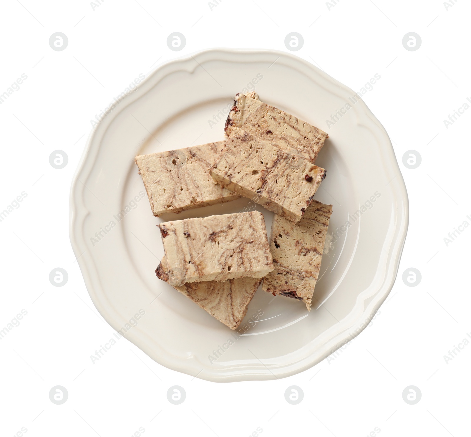 Photo of Pieces of tasty chocolate halva isolated on white, top view