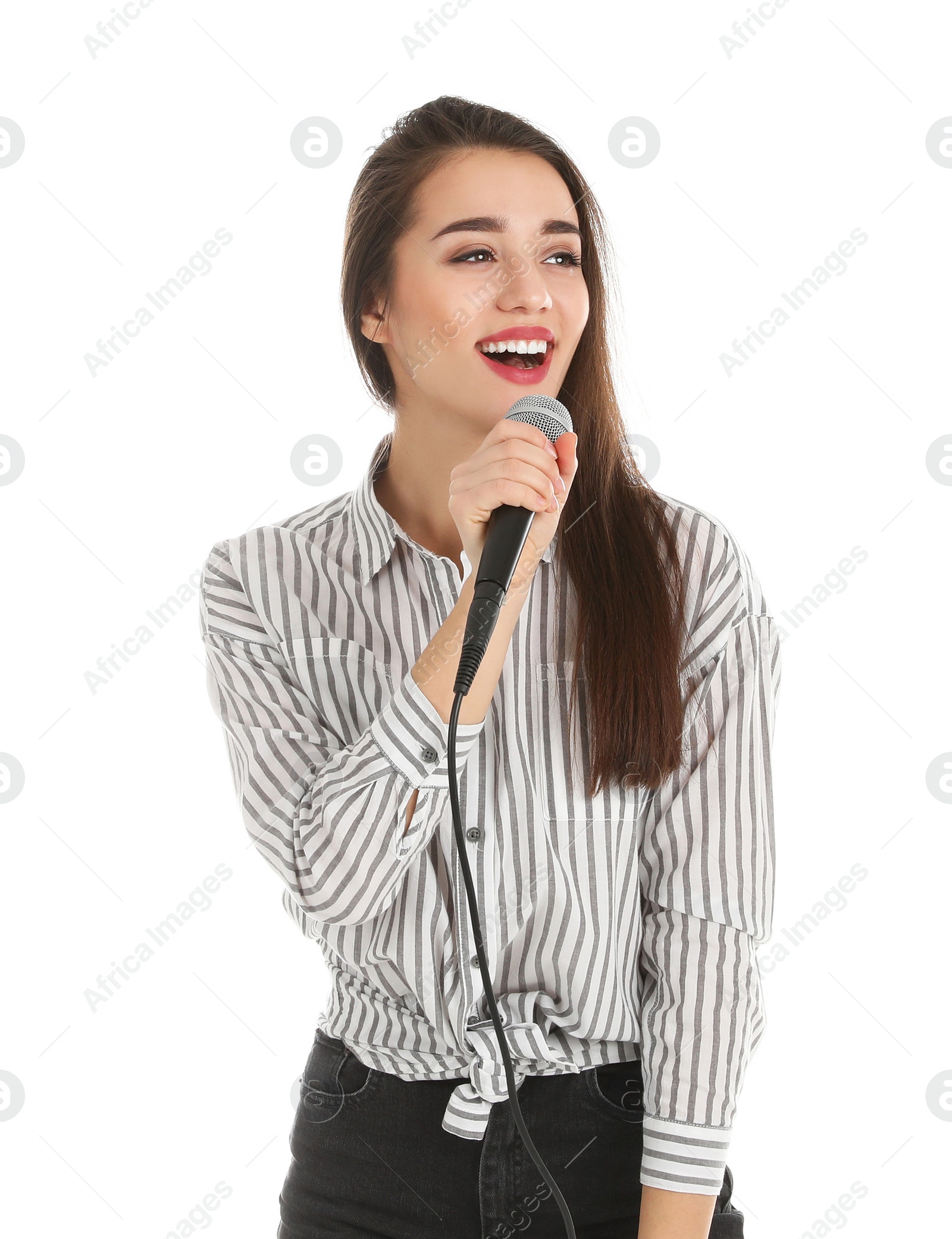 Photo of Young woman wearing casual clothes singing in microphone on white background