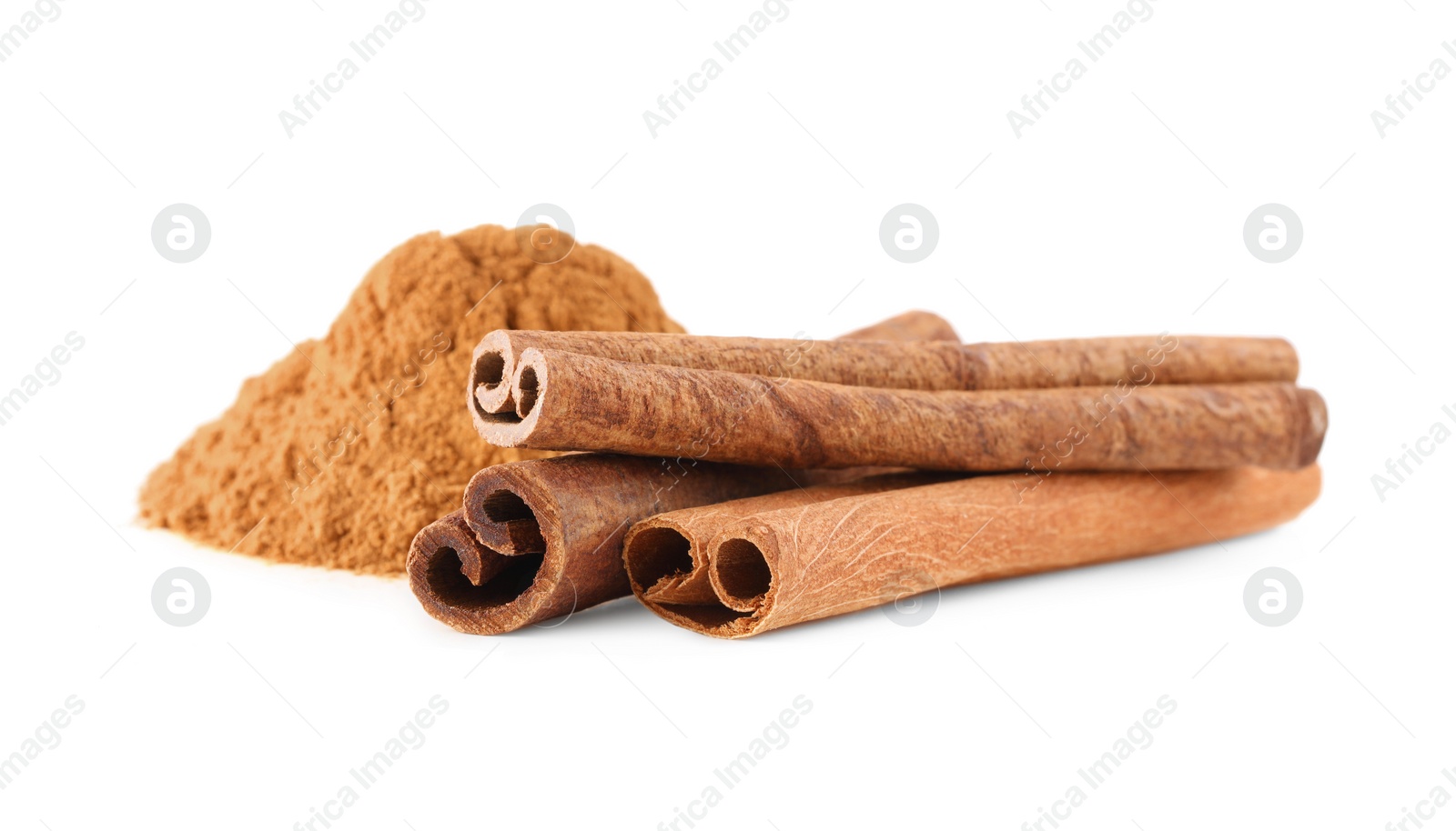 Photo of Dry aromatic cinnamon sticks and powder isolated on white