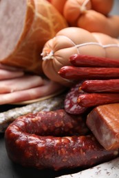 Different types of sausages on table, closeup