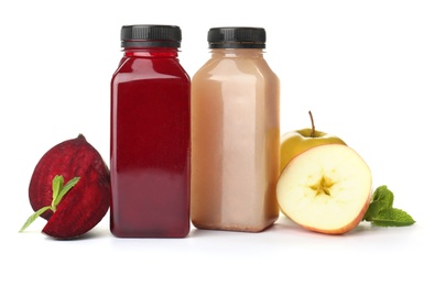 Photo of Bottles with healthy detox smoothies and ingredients on white background