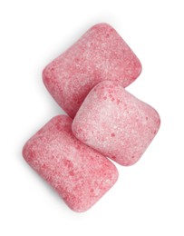 Photo of Heap of tasty sweet chewing gums on white background, top view