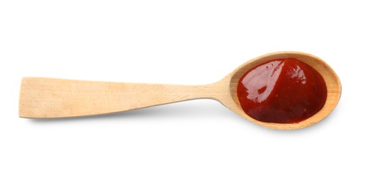 Tasty ketchup in wooden spoon isolated on white, top view