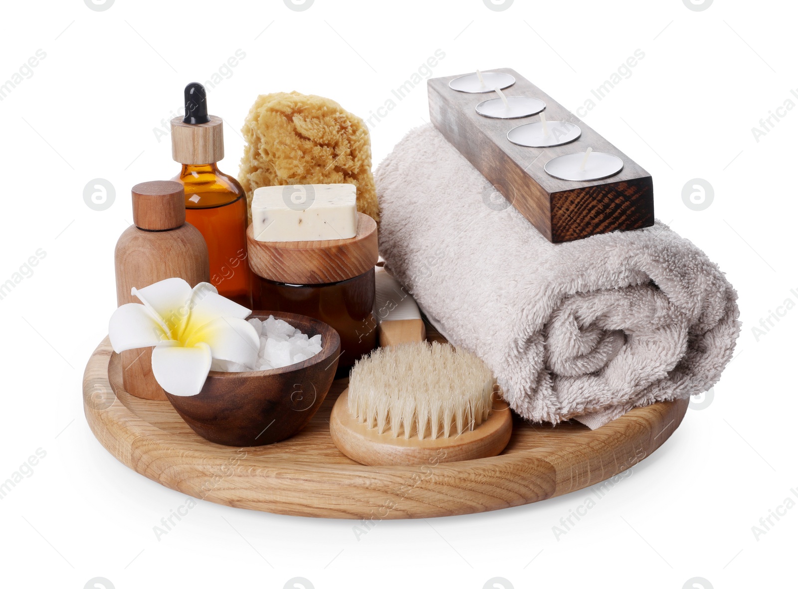 Photo of Composition with spa products, flower and candles isolated on white