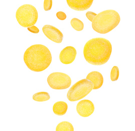 Image of Yellow carrot slices falling on white background