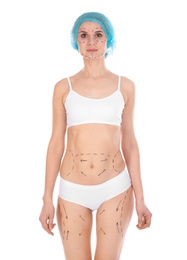 Woman with marks on body for cosmetic surgery operation against white background