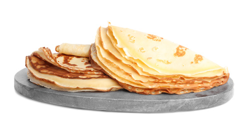 Photo of Delicious fresh thin pancakes isolated on white