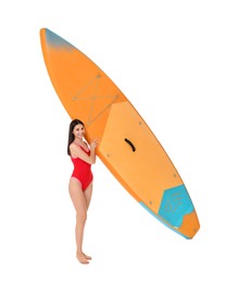 Happy woman with orange SUP board on white background
