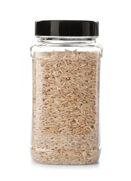 Jar with brown rice on white background