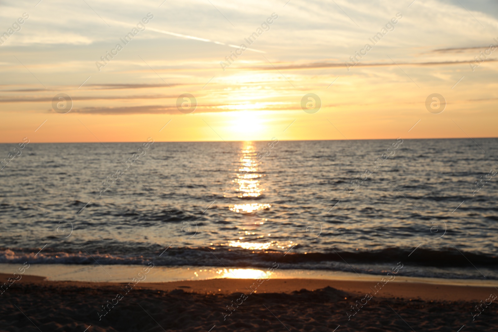 Photo of Blurred view of beautiful sea at sunset. Tropical beach