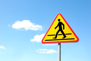 Photo of Traffic sign Pedestrian Crossing Ahead against blue sky, space for text