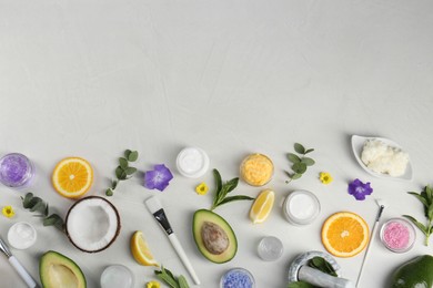 Photo of Flat lay composition with homemade cosmetic products and fresh ingredients on light grey background. Space for text