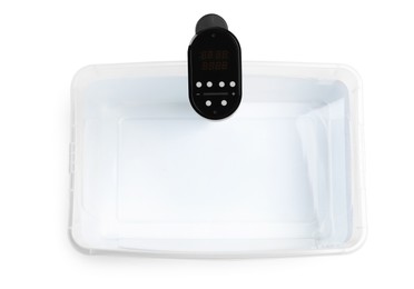 Thermal immersion circulator in plastic container with water isolated on white, top view. Sous vide cooker