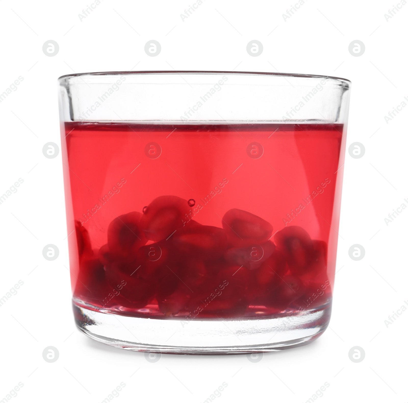 Photo of Tasty jelly dessert with pomegranate seeds in glass on white background